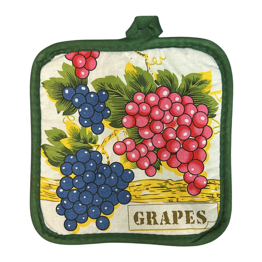Potholder with grapes design on a white background