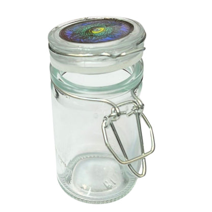Clear glass jar with a metal clasp on a white background
