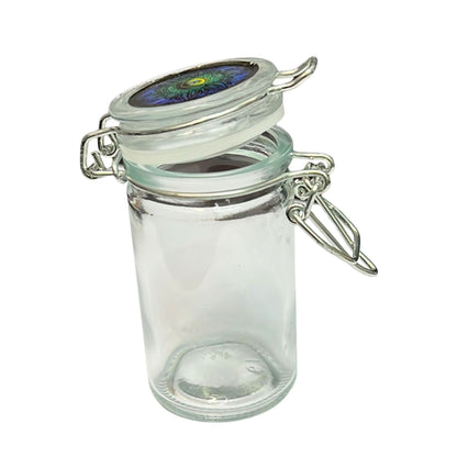 Clear glass jar with a metal clasp on a white background