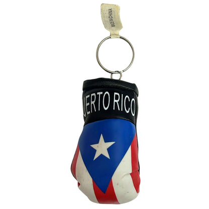 Keychain in the shape of a boxing glove with Puerto Rican flag design on a white background