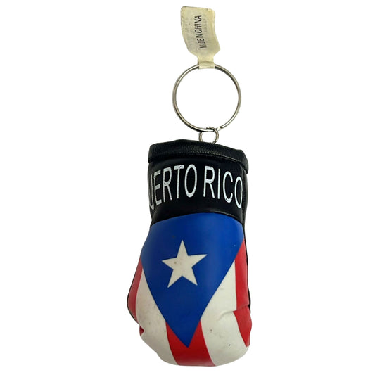 Keychain in the shape of a boxing glove with Puerto Rican flag design on a white background