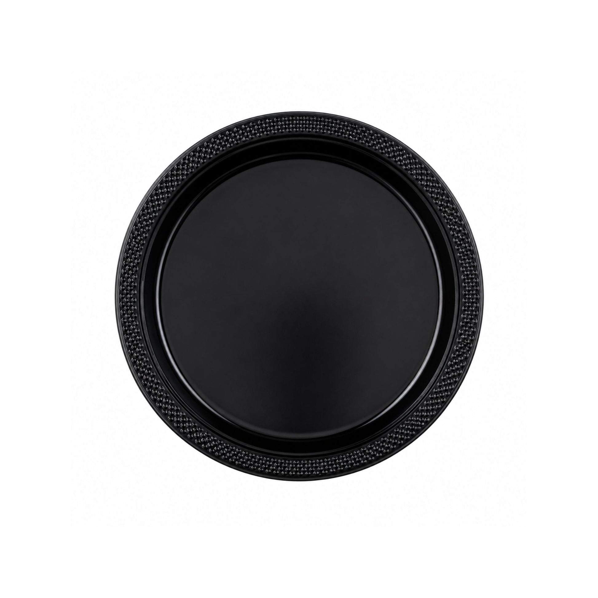 Black round plate with textured rim on a white background