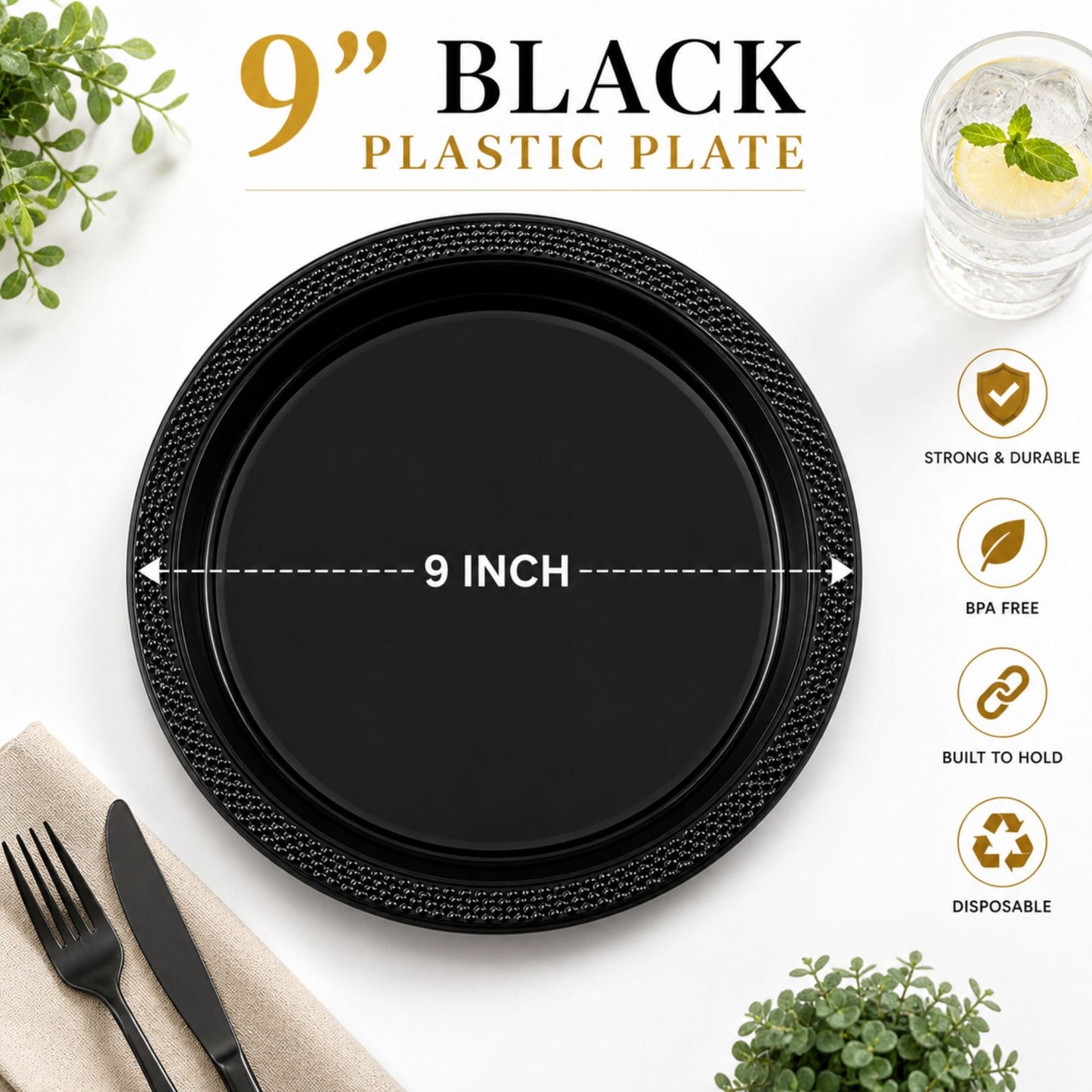 Black plastic plate with text indicating size and features, placed on a white surface with cutlery and plants.