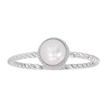 Silver ring with a pearl on a white background