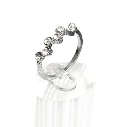 Silver ring with gemstones on a white background