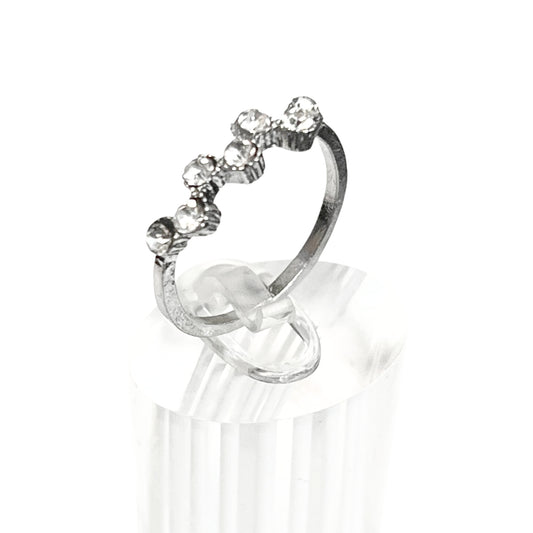 Silver ring with gemstones on a white background