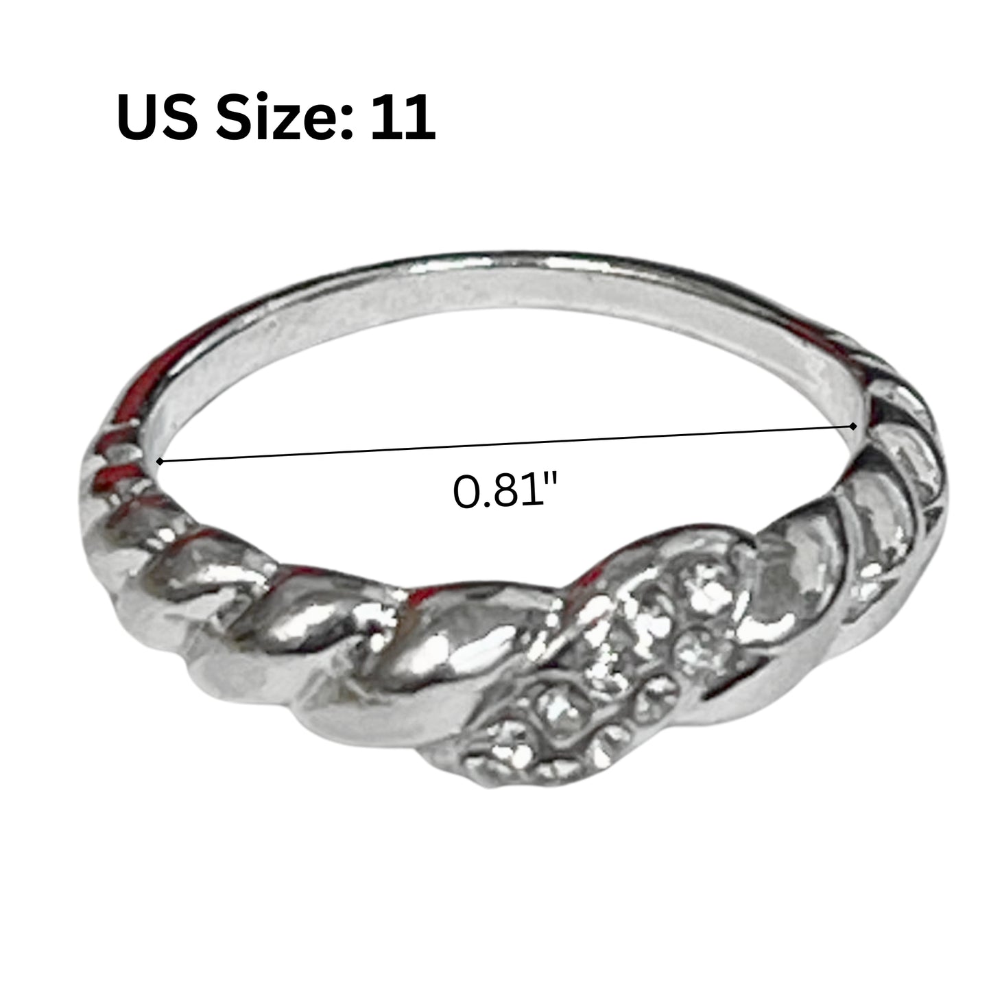 Silver ring with intricate design on a white background, size US 11.
