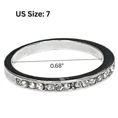 Silver ring with gemstones and measurement details on a white background