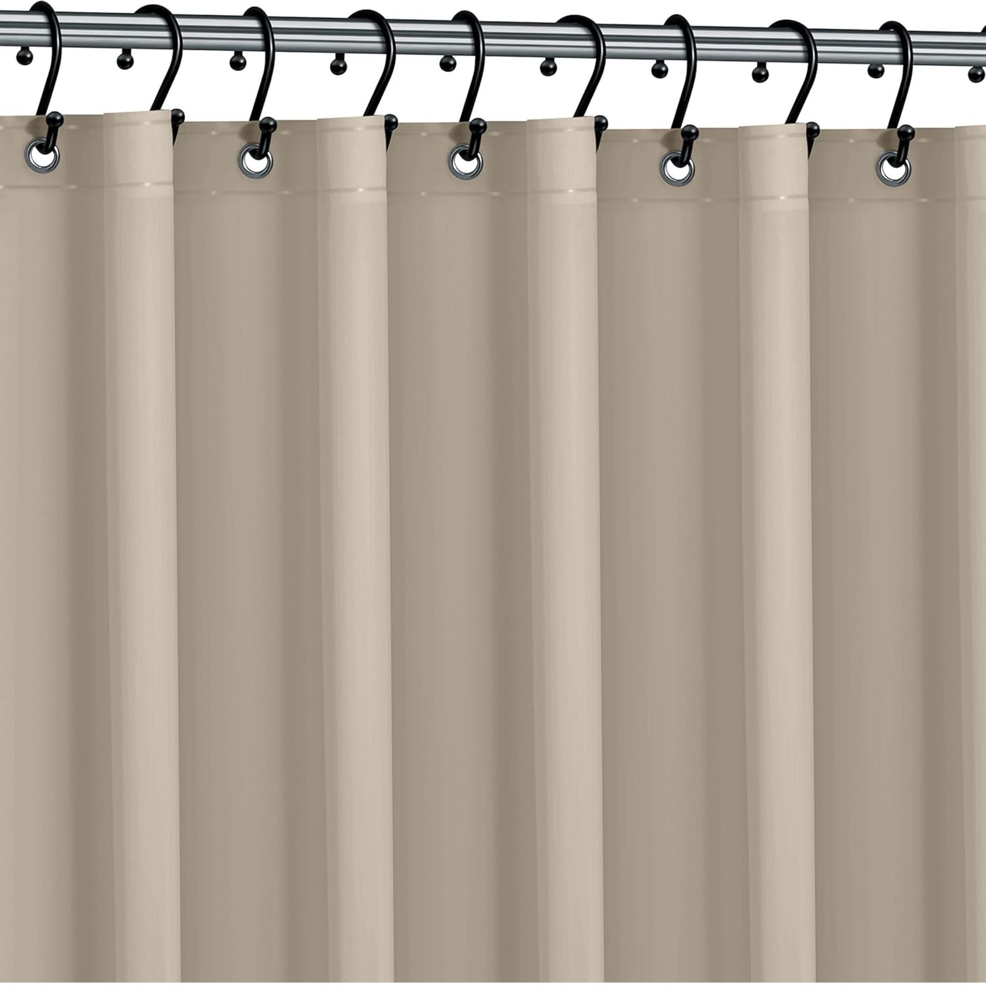 Beige shower curtain with black hooks on a silver rod