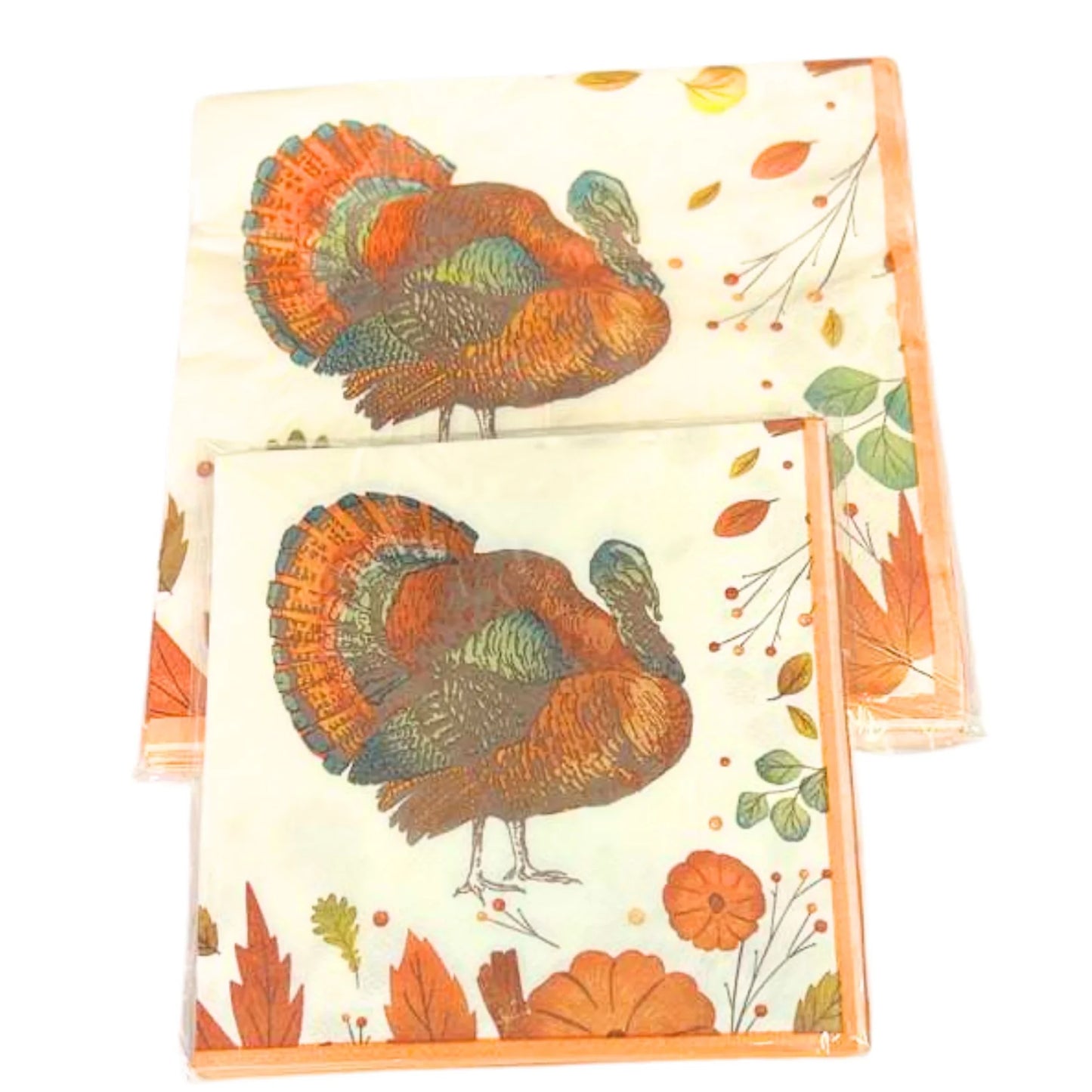 Two decorative napkins with turkey and autumn leaf designs on a white background