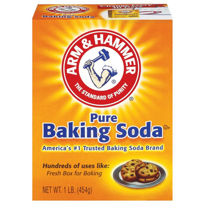 Box of Arm & Hammer Pure Baking Soda with branding and product details on a white background