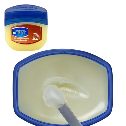 Vaseline Blue Seal jar with a close-up of the jelly inside on a white background